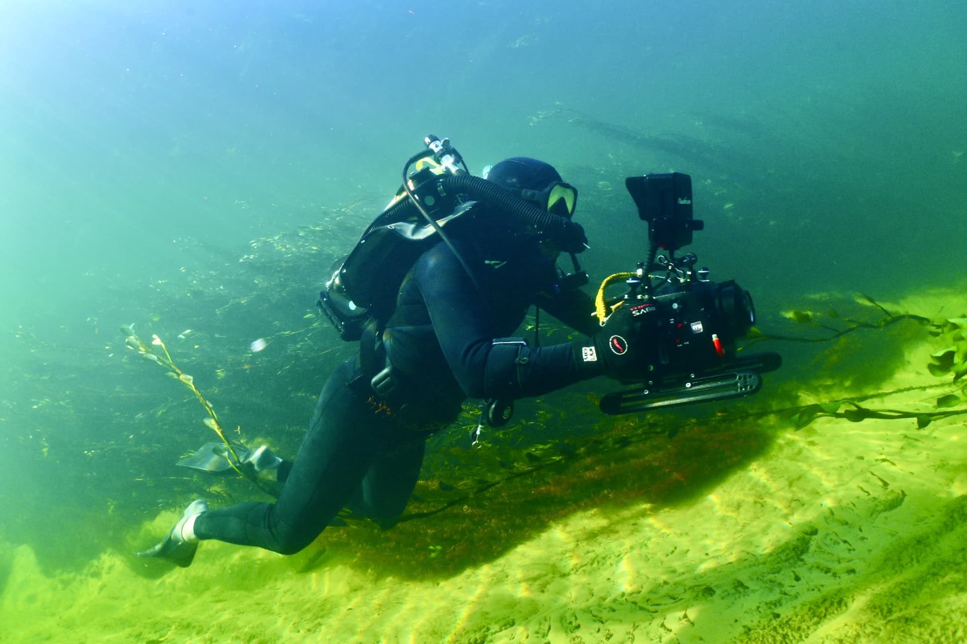 Underwater filmmaker using a rebreather in the Pantanal